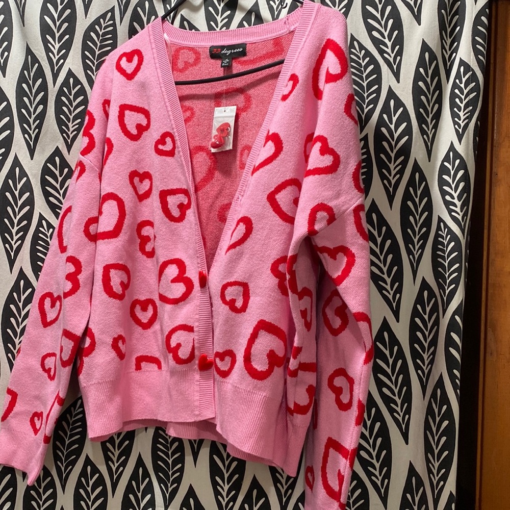 This cardigan is super cute….it’s brand new with tags…